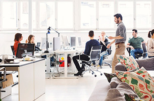 Modern busy office full of people