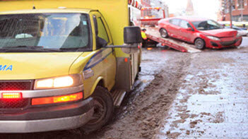 Car getting towed after accident