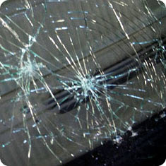 Image showing bullseye damage to a windshield.