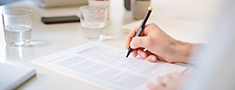 Cropped view of businessman signing contract