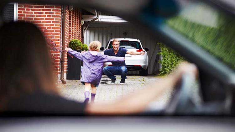 Newly divorced father greets his daughter after her mother drops her off
